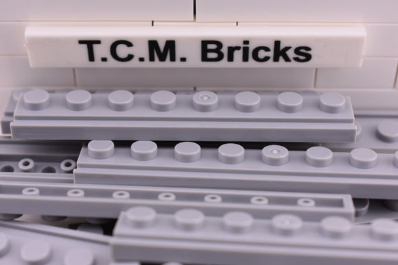 Light Bluish Gray / 4510 TCM Bricks Plate, Modified 1 x 8 with Door Rail